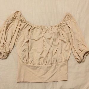 Stomach showing half shirt, can sit off shoulders